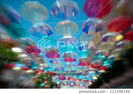 Photographing colorful umbrellas hanging in a shopping center in Kusatsu City, Shiga Prefecture Photographing colorful umbrellas hanging in a shopping center in Kusatsu City, Shiga Prefecture 121346148
