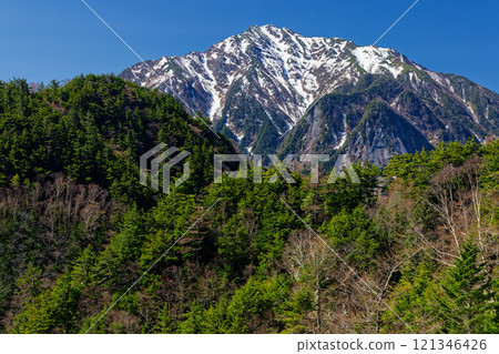 Mt. Kaikoma with snow remaining as seen from Mt. Hinata Mt. Kaikoma with snow remaining as seen from Mt. Hinata 121346426