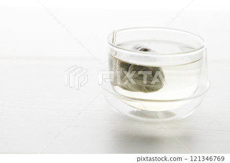 cup of hot tea and tea bag 121346769