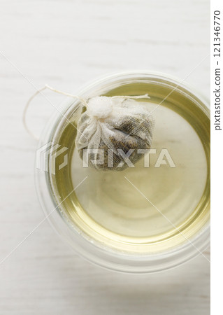 cup of hot tea and tea bag 121346770