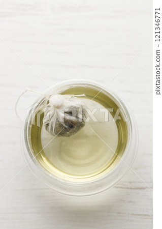 cup of hot tea and tea bag 121346771