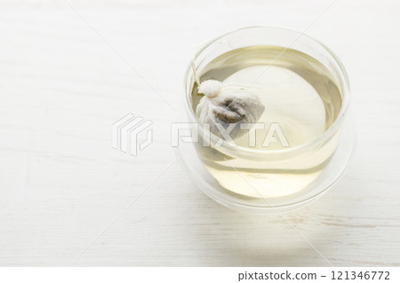 cup of hot tea and tea bag 121346772