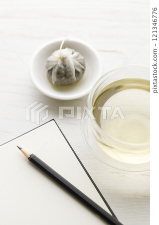 cup of hot tea and tea bag cup of hot tea and tea bag 121346776