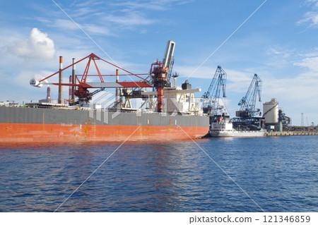 A view of ships loading and unloading in the Kashima coastal industrial area A view of ships loading and unloading in the Kashima coastal industrial area 121346859