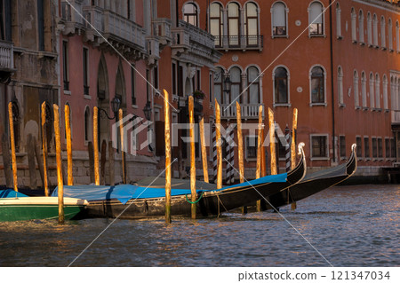 Venice, Italy gondolas parked, Grand canal 121347034
