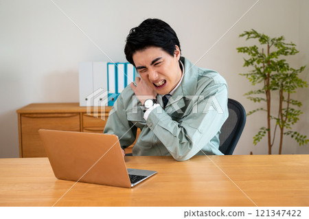 Man suffering from stiff shoulders 121347422