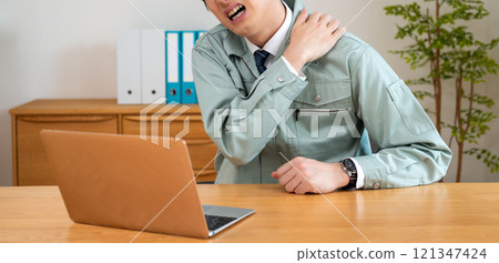 Man suffering from stiff shoulders 121347424