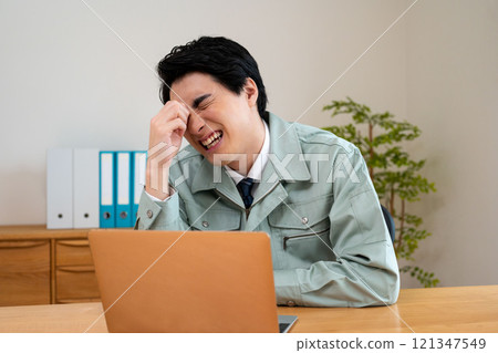 Man suffering from tired eyes Man suffering from tired eyes 121347549