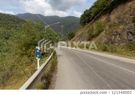 Scenic road through Gilan Province surrounded by mountains and lush greenery Scenic road through Gilan Province surrounded by mountains and lush greenery 121348005