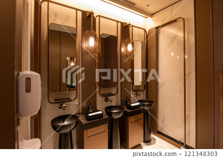 A modern toilet at the luxury hotel Mesm Tokyo, located inside Waters Takeshiba near Hamamatsucho Station and Takeshiba Station A modern toilet at the luxury hotel Mesm Tokyo, located inside Waters Takeshiba near Hamamatsucho Station and Takeshiba Station 121348303