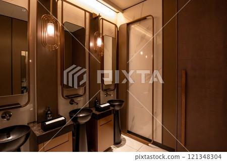 A modern toilet at the luxury hotel Mesm Tokyo, located inside Waters Takeshiba near Hamamatsucho Station and Takeshiba Station A modern toilet at the luxury hotel Mesm Tokyo, located inside Waters Takeshiba near Hamamatsucho Station and Takeshiba Station 121348304