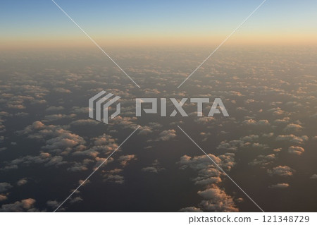 Landscape and evening view from an airplane Landscape and evening view from an airplane 121348729