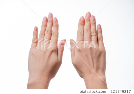 Woman's hands with gel nails 121349217