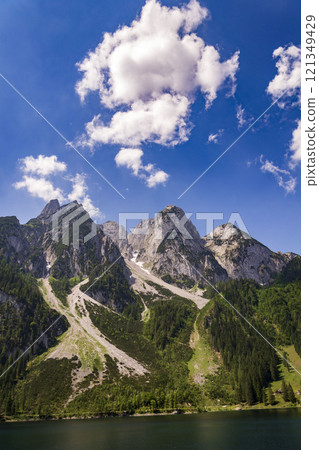 Ferrata Donnerkogel between Grosser and Kleiner Donnerkogel Mountain in Alps, Gosau, Gmunden district, Upper Austria federal state, sunny summer day Ferrata Donnerkogel between Grosser and Kleiner Donnerkogel Mountain in Alps, Gosau, Gmunden district, Upper Austria federal state, sunny summer day 121349429