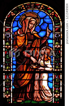 Saint Anne, stained glass window in the Santi Paolino e Donato church in Lucca, Tuscany, Italy 121349904