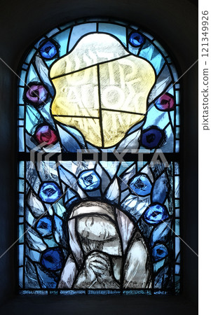 Stained glass window by Sieger Koder in chapel in Hutten, Germany Stained glass window by Sieger Koder in chapel in Hutten, Germany 121349926