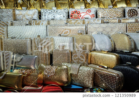 Decorative handbags displayed for sale in New Market area, Kolkata, India 121350989