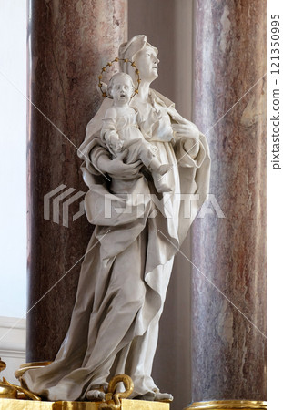 Saint Anne statue on the main altar in Amorbach Benedictine monastery church in Lower Franconia, Bavaria, Germany Saint Anne statue on the main altar in Amorbach Benedictine monastery church in Lower Franconia, Bavaria, Germany 121350995