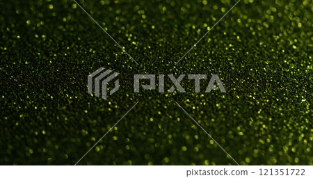Bokeh shimmering. Sparkly powder. Flare luxury festive surface with blurred metallic dust. Green glowing on precious glamour background. 121351722