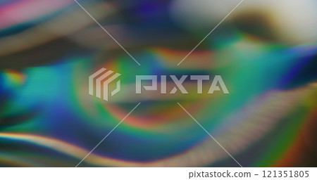 Blur ray rainbow. Crystal beam. Defocused leak green blue multicolor sparkling iridescent flickers beam lens flare on abstract art background. 121351805