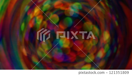 Soft holographic rainbow. Blurred rays streaks. Defocused leak multicolor green yellow flickers beam lens flare on abstract bokeh light art background. Soft holographic rainbow. Blurred rays streaks. Defocused leak multicolor green yellow flickers beam lens flare on abstract bokeh light art background. 121351809