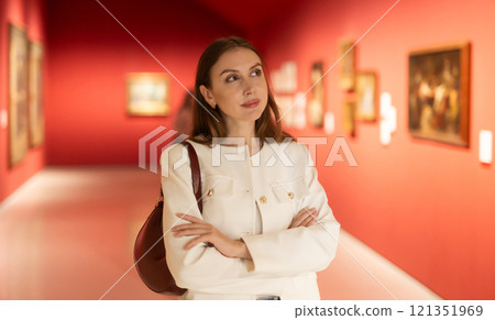 Girl view pictures and icons in museum hall Girl view pictures and icons in museum hall 121351969