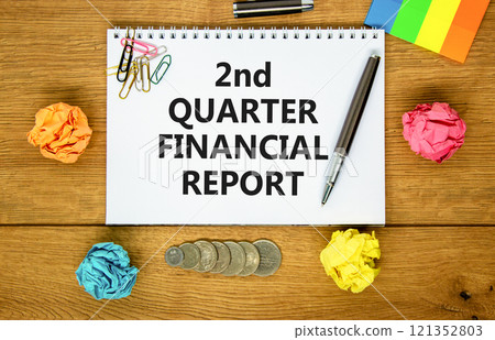 2nd quarter financial report symbol. Concept words 2nd quarter financial report on beautiful white note. Beautiful wooden background. Business 2nd quarter financial report concept. Copy space. 121352803