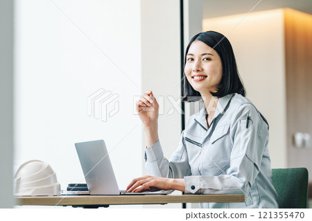 Young woman in construction management 121355470