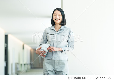 Portrait of a young construction manager wearing work clothes 121355490