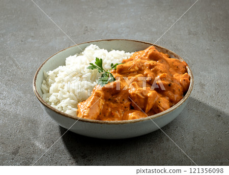 bowl of Chicken Tikka Masala with Rice 121356098