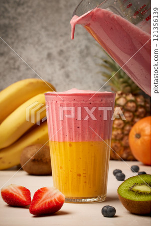 glass of fresh delicious colorful smoothie glass of fresh delicious colorful smoothie 121356139
