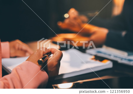 Judge gavel with Justice lawyers having team meeting at law firm background. Concepts of Law and Legal services. 121356950
