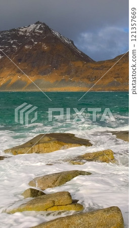 Norwegian Sea and rocky beach. Lofoten islands, Norway Norwegian Sea and rocky beach. Lofoten islands, Norway 121357669