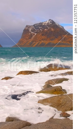 Norwegian Sea and rocky beach. Lofoten islands, Norway Norwegian Sea and rocky beach. Lofoten islands, Norway 121357751