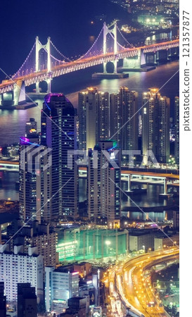 Busan skyscrapers and Gwangan Bridge, South Korea aerial view timelapse at night Busan skyscrapers and Gwangan Bridge, South Korea aerial view timelapse at night 121357877