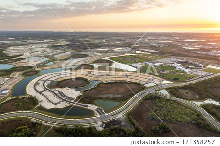 Beginning of construction works on prepared ground. Large building site in American rural area. Development of residential housing in US suburbs. Real estate market in USA 121358257