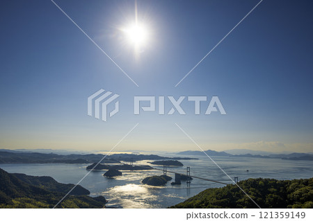 Shimanami Kaido: Kurushima Kaikyo Bridge and the Seto Inland Sea as seen from Kirosan Observation Park in the afternoon light. Photographed with a Nikon Z50 121359149