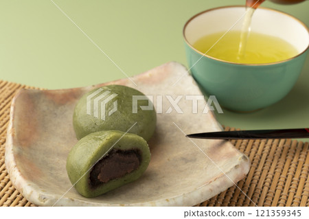 Kusamochi, mugwort mochi, spring flavors, green background 121359345