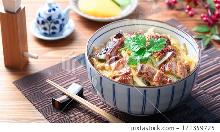 Unatama-don (Soft and fluffy eel with egg on rice) Unatama-don (Soft and fluffy eel with egg on rice) 121359725