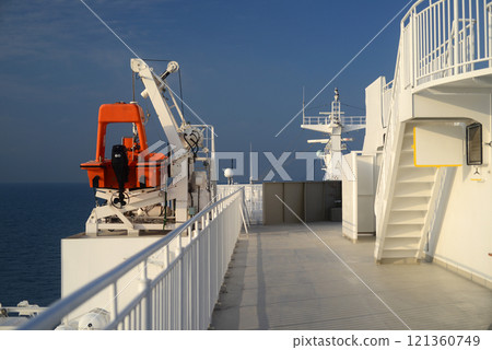 Ferryboat exterior gangway and lifeboat Ferryboat exterior gangway and lifeboat 121360749