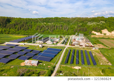 Aerial view of electrical power plant with rows of solar photovoltaic panels for producing clean ecological electric energy at industrial area. Renewable electricity with zero emission concept. 121360824