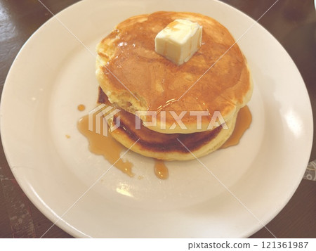 Pancakes eaten by children Pancakes eaten by children 121361987