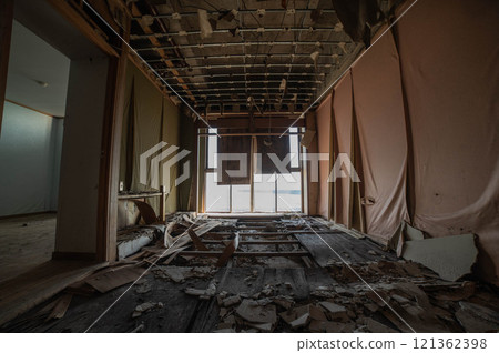 Remains of an abandoned inn's guest room on the seafront Remains of an abandoned inn's guest room on the seafront 121362398