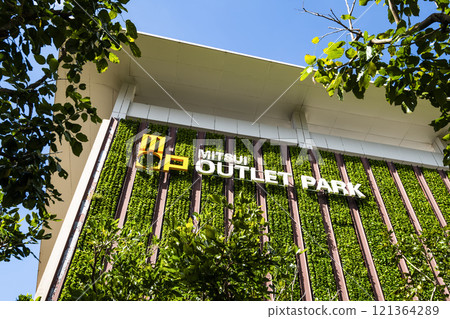 Low-angle view of the Mitsui Outlet Park Linkou in New Taipei City, Taiwan. It is Mitsui Fudosan's third overseas base. Low-angle view of the Mitsui Outlet Park Linkou in New Taipei City, Taiwan. It is Mitsui Fudosan's third overseas base. 121364289