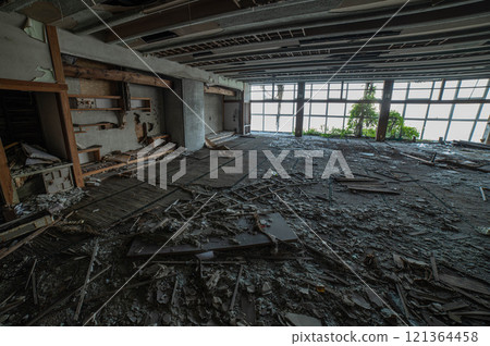 Remains of a large hall in an abandoned hotel on the seafront 121364458