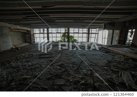 Remains of a large hall in an abandoned hotel on the seafront 121364460