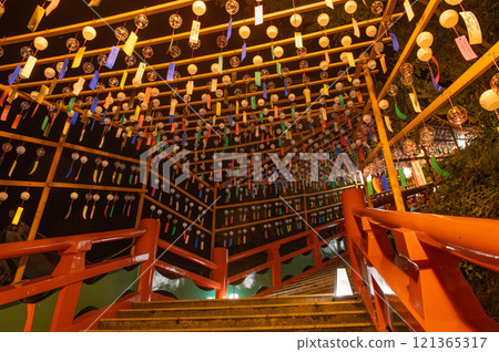 The approach to Yutoku Inari Shrine decorated with wind chimes The approach to Yutoku Inari Shrine decorated with wind chimes 121365317