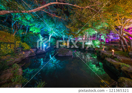 The illuminated Japanese garden of Yutoku Inari Shrine 121365321