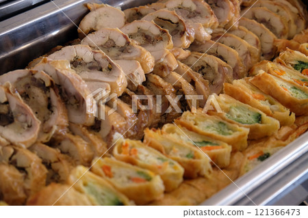 Sliced filled pork fillet 121366473