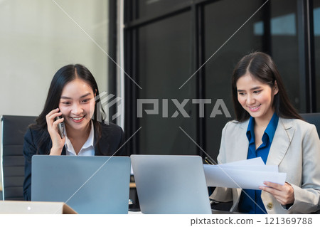 businessteam creative woman coworker in office Happy to be successful partnership teamwork success. businessteam creative woman coworker in office Happy to be successful partnership teamwork success. 121369788